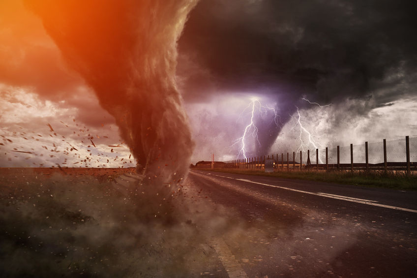 55708751 - view of a large tornado destroying a road