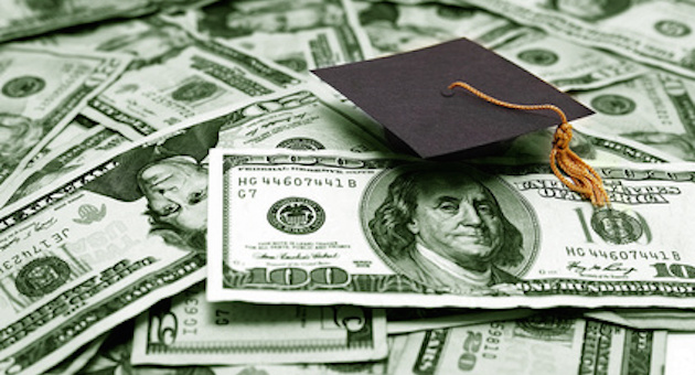 small graduation cap and money -- educational cost concept