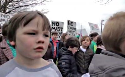 CHILDREN IN IRELAND SINGING AGAINST PLAN TO INSTALL CELL TOWER IN SCHOOL