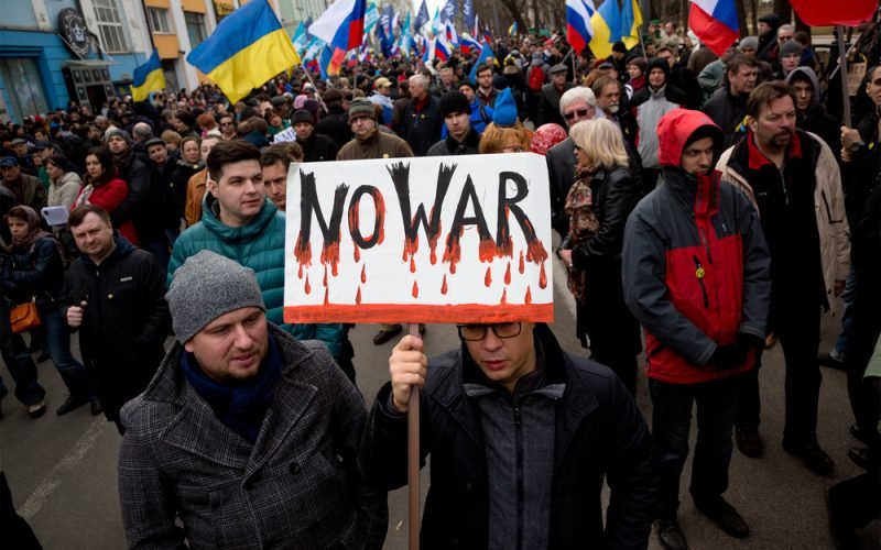 Russians Take To The Streets In Protest & Chant “No To War”
